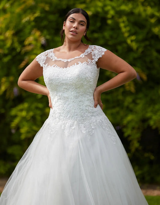 DingJiDress a metallic lace gown with illusion neckline Wedding Dresses