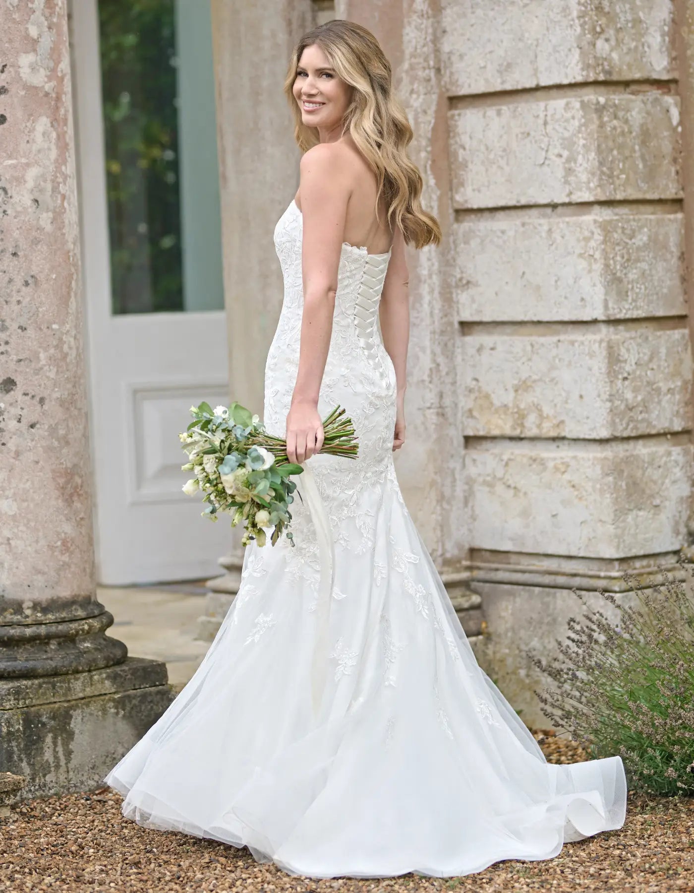 a lace mermaid wedding dress