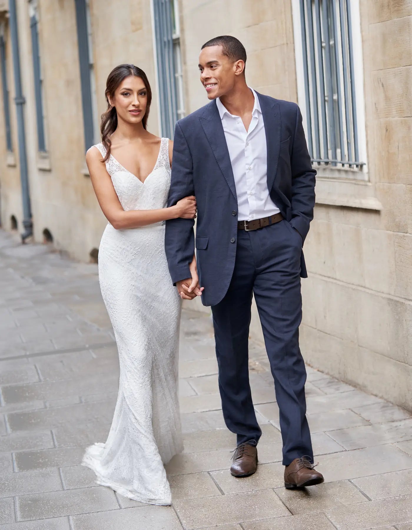 DingJiDress an all-over lace sheath gown