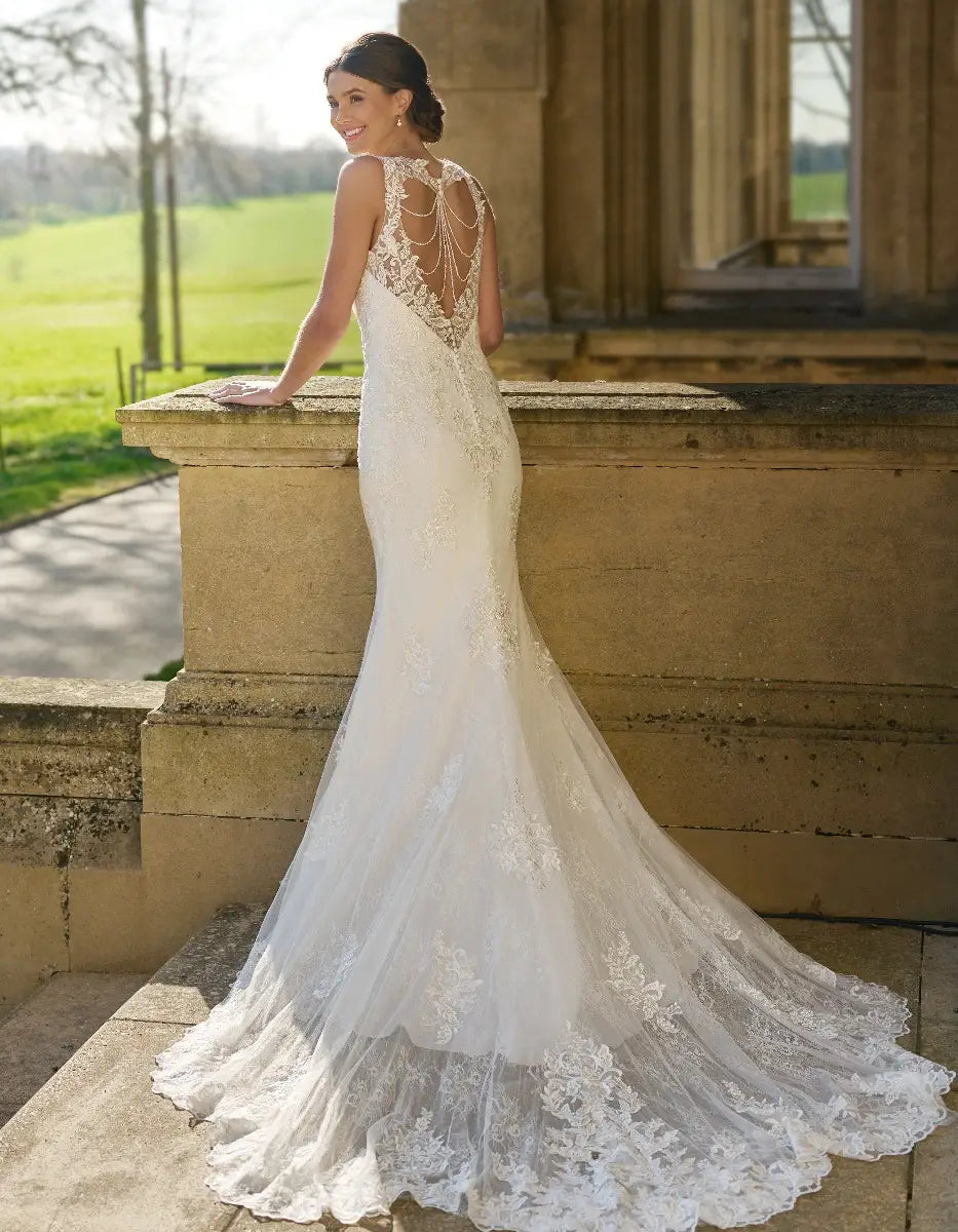 DingJiDress striking sheath with straps and draped beaded back