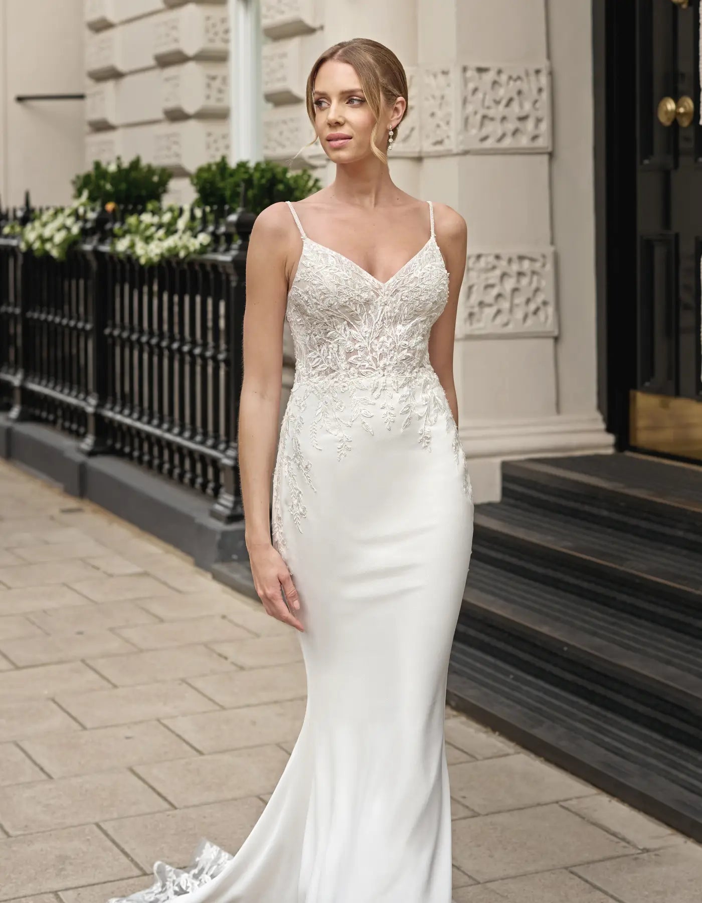 a lace and crepe gown with keyhole back