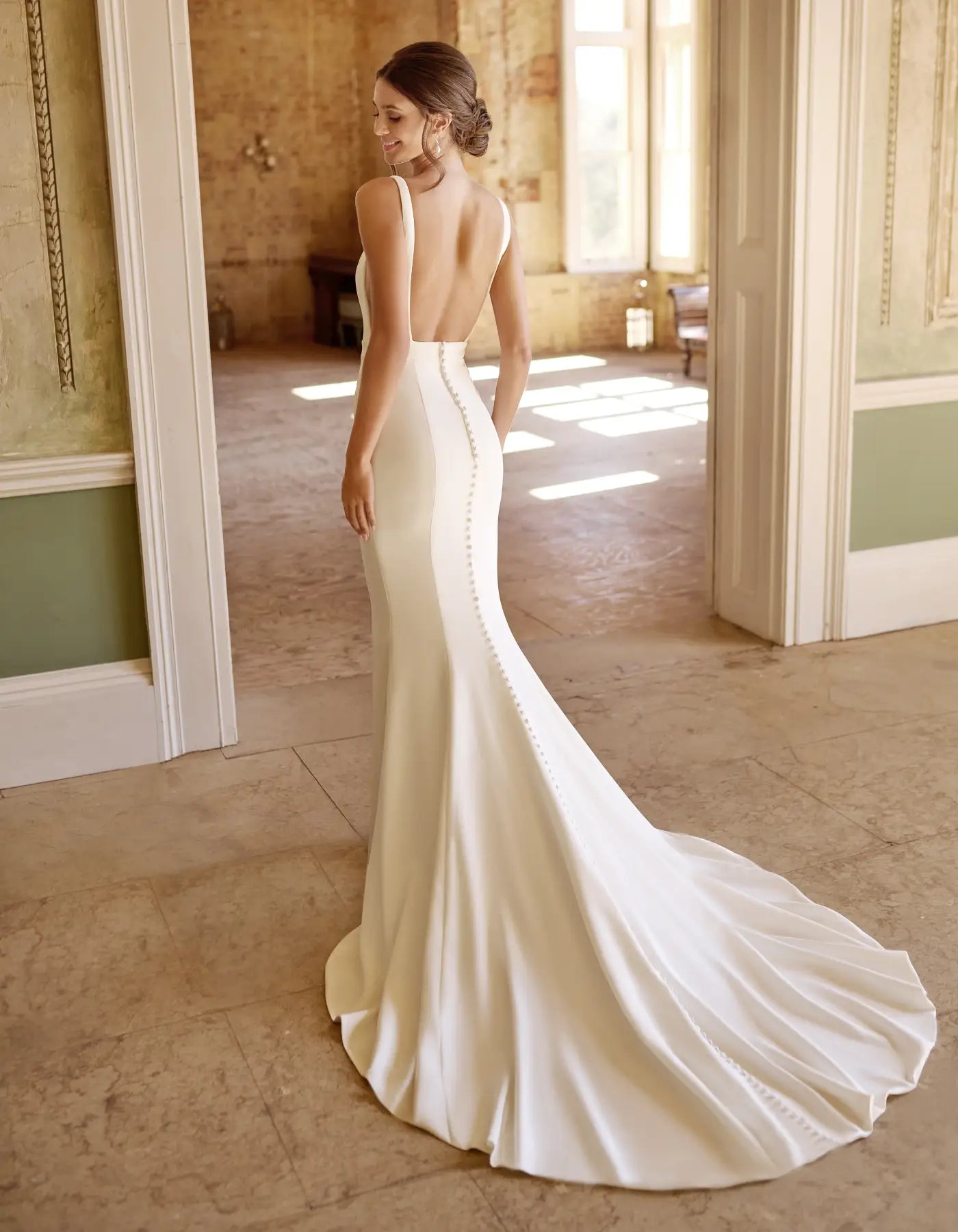 a low back crepe sheath gown