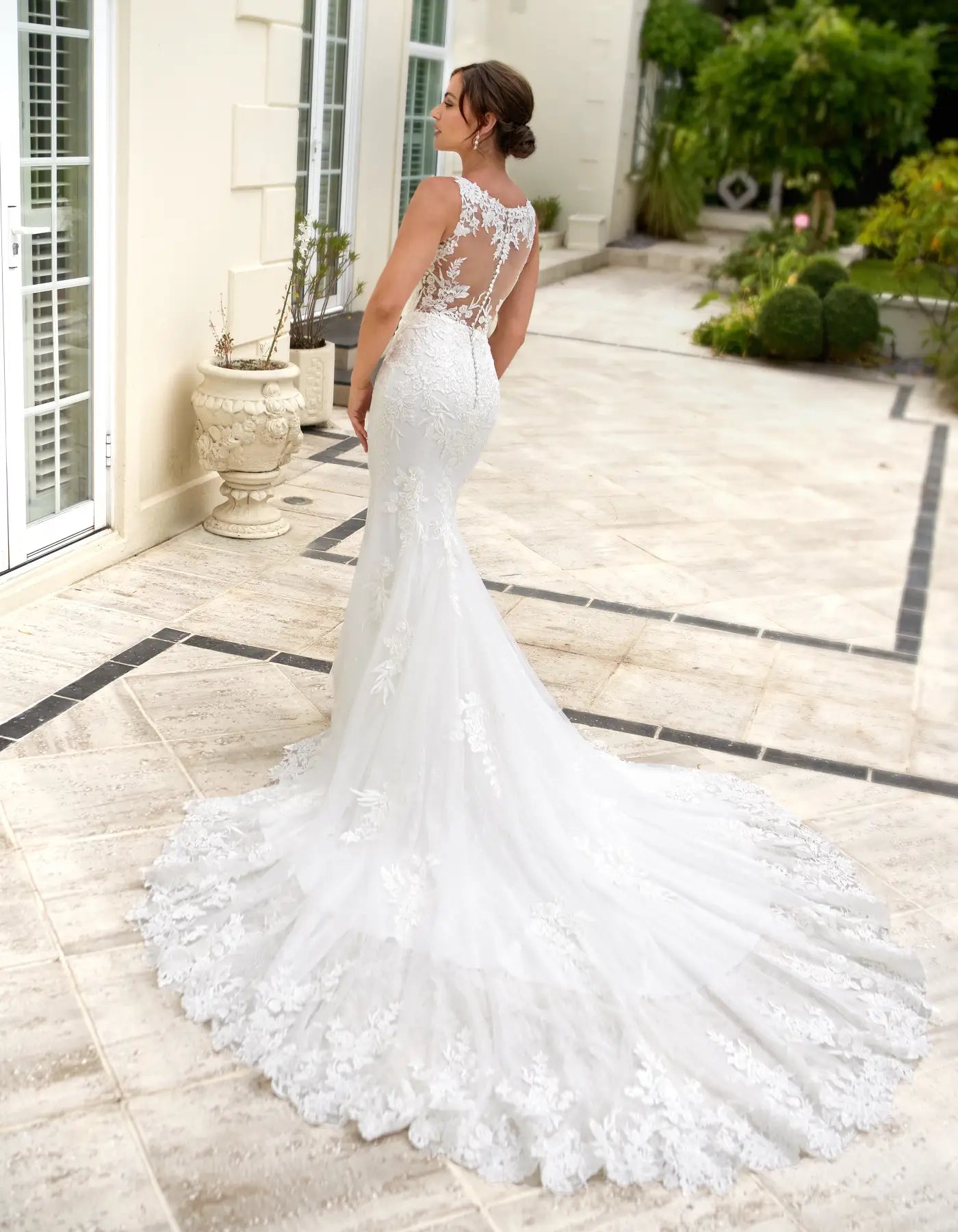 DingJiDress a glamourous sheath gown with striking back