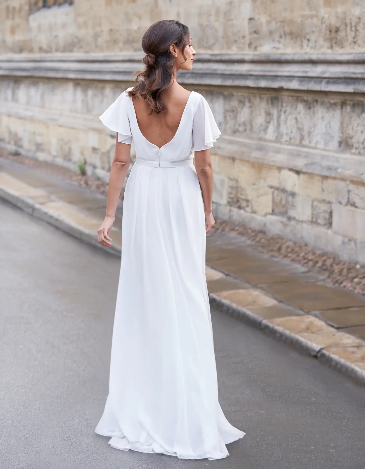 DingJiDress an ethereal boho gown with angel sleeves