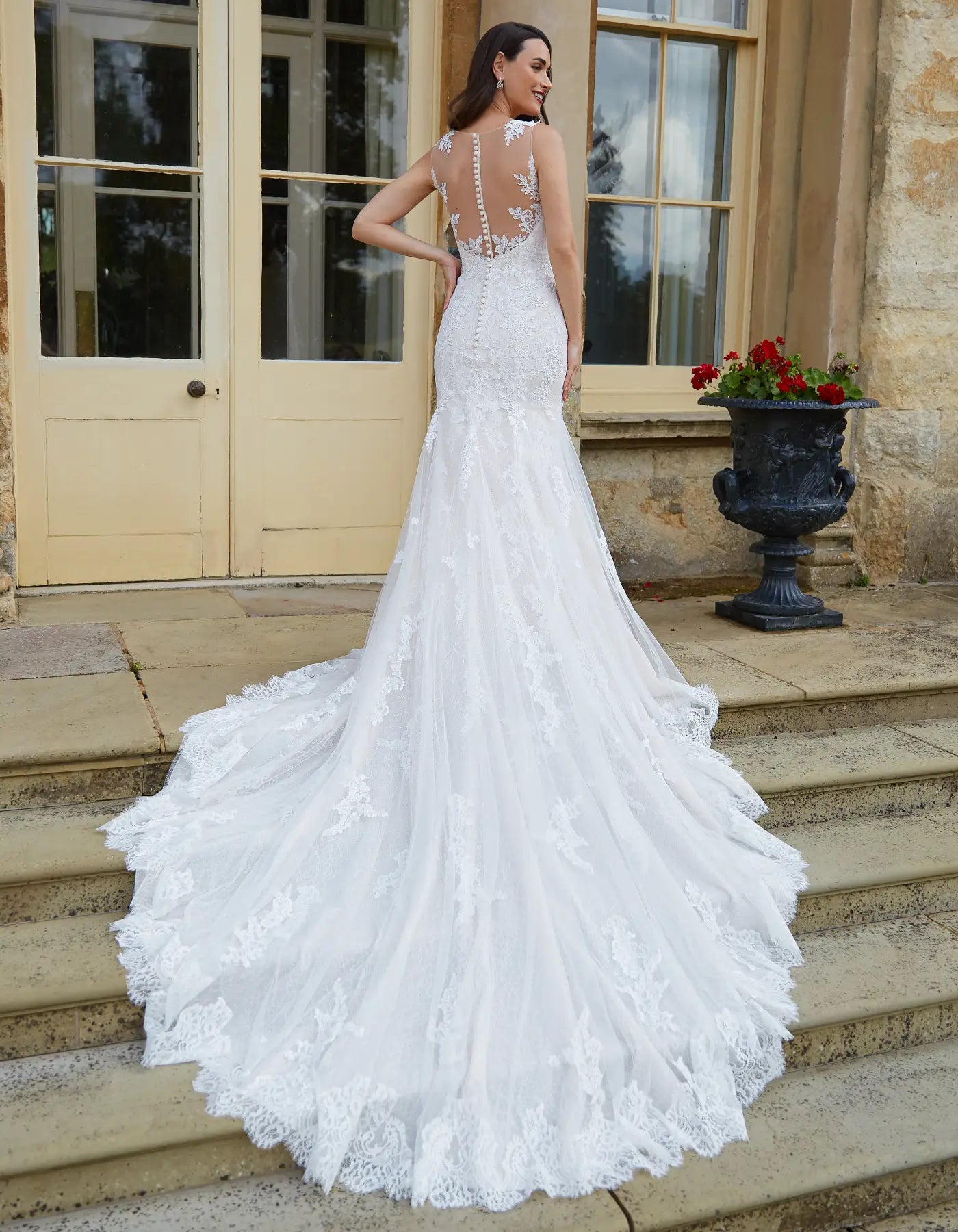 DingJiDress a mermaid gown with statement back and train