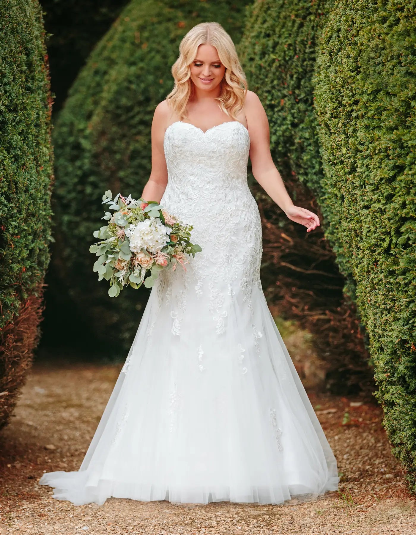 DingJiDress an ornate lace mermaid gown