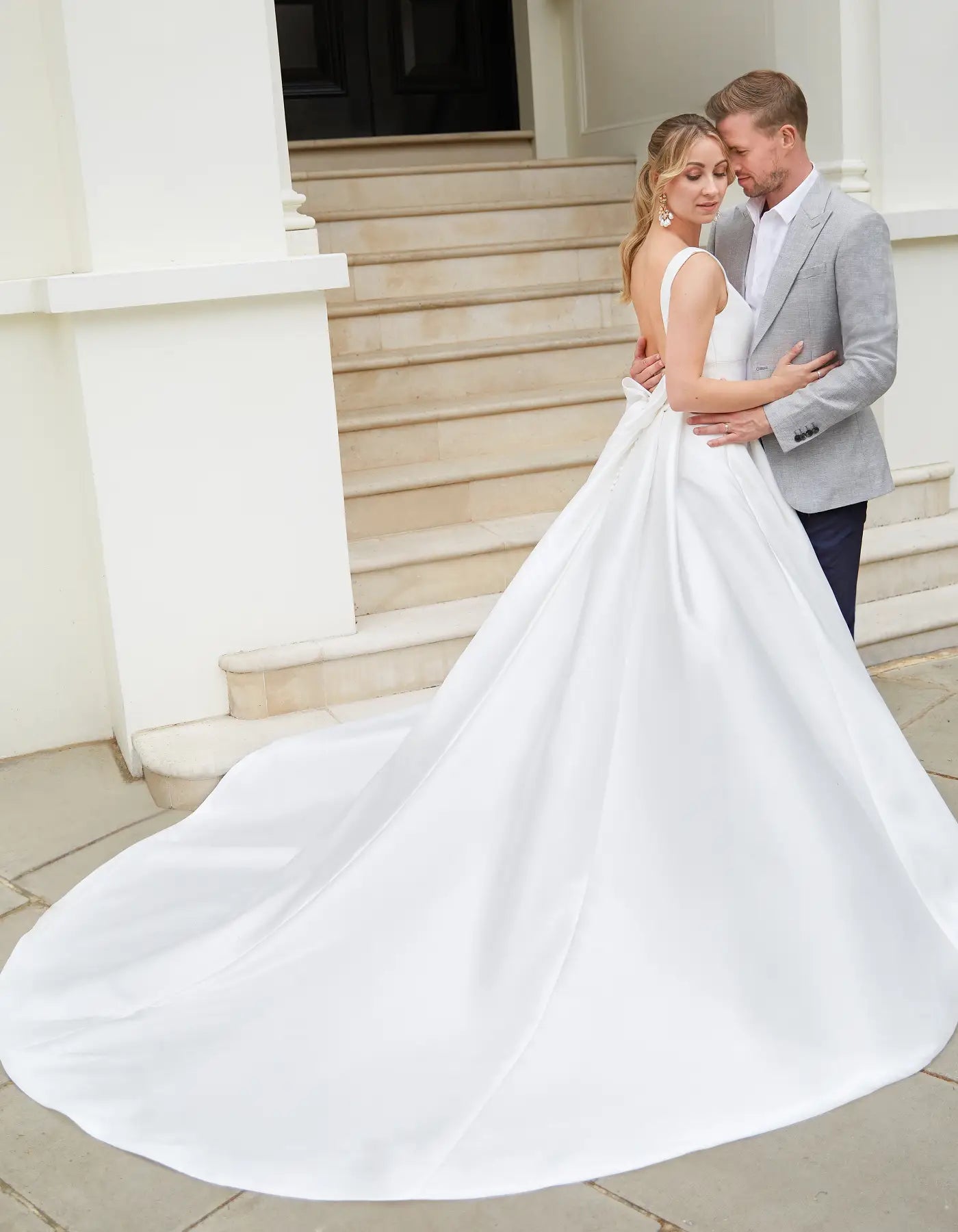 DingJiDress a statement mikado gown with pockets