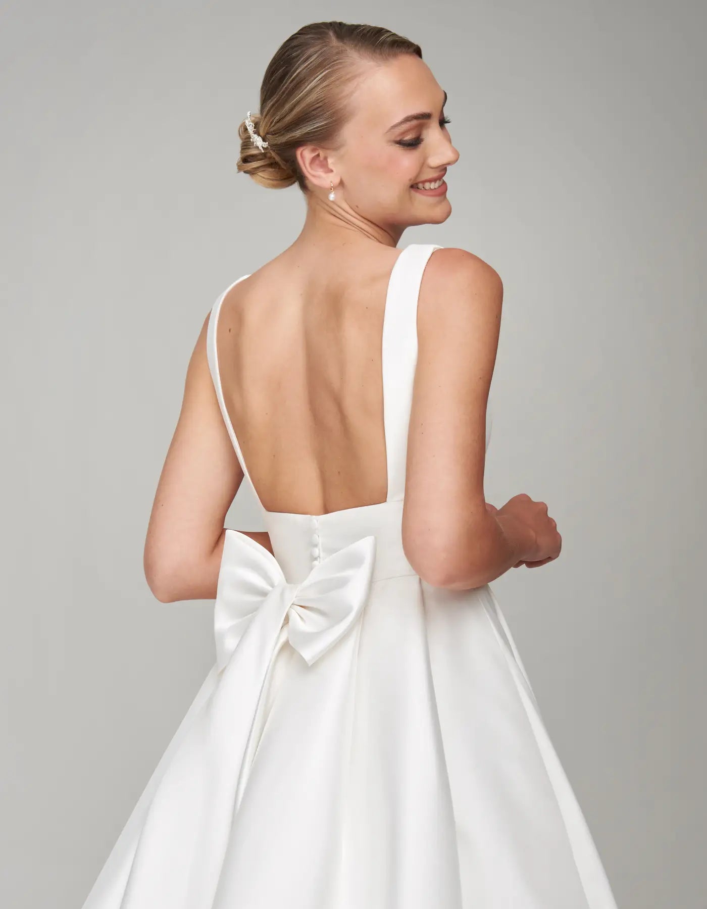 DingJiDress a statement mikado gown with pockets