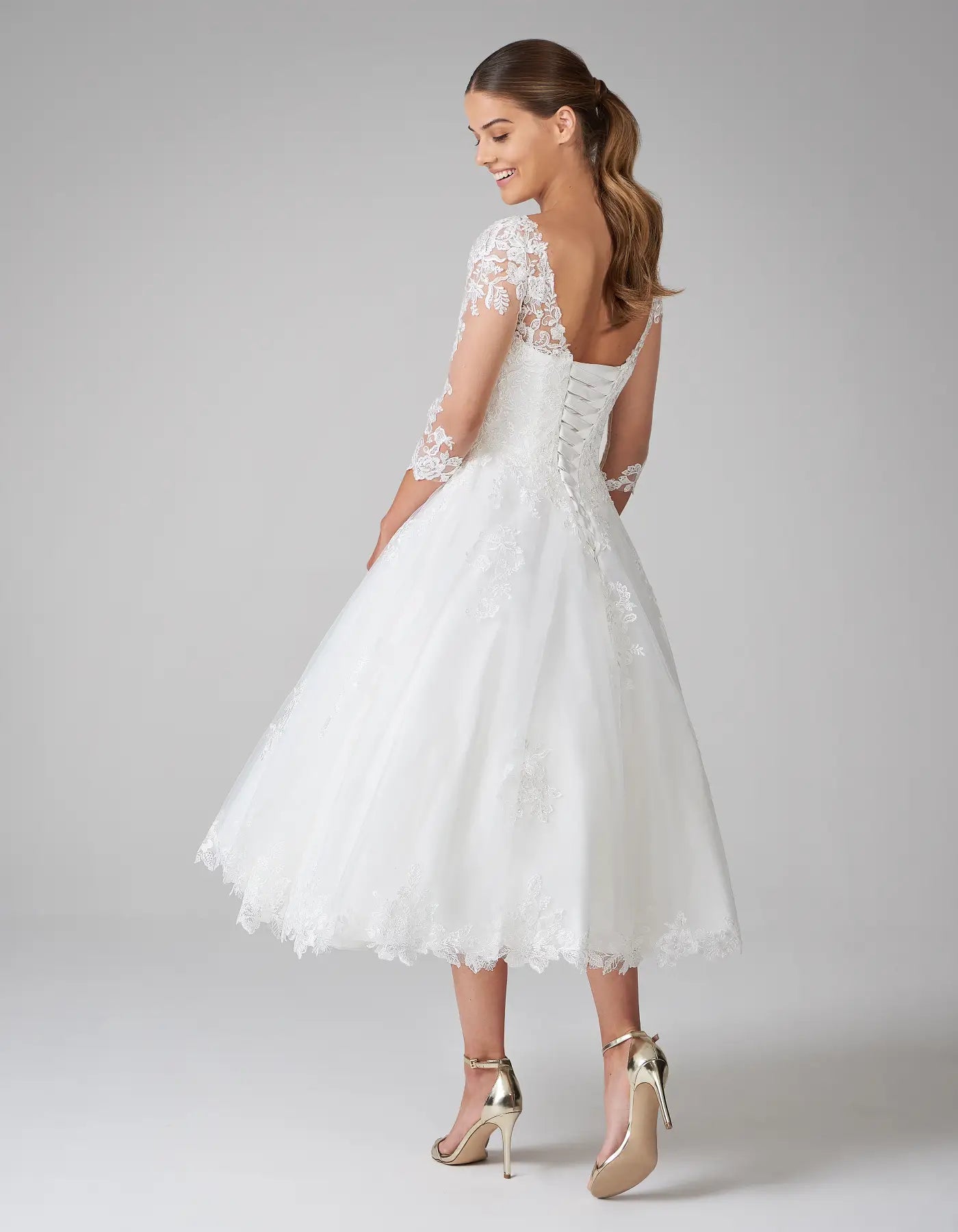 DingJiDress a modern tea length dress with sleeves Wedding Dresses