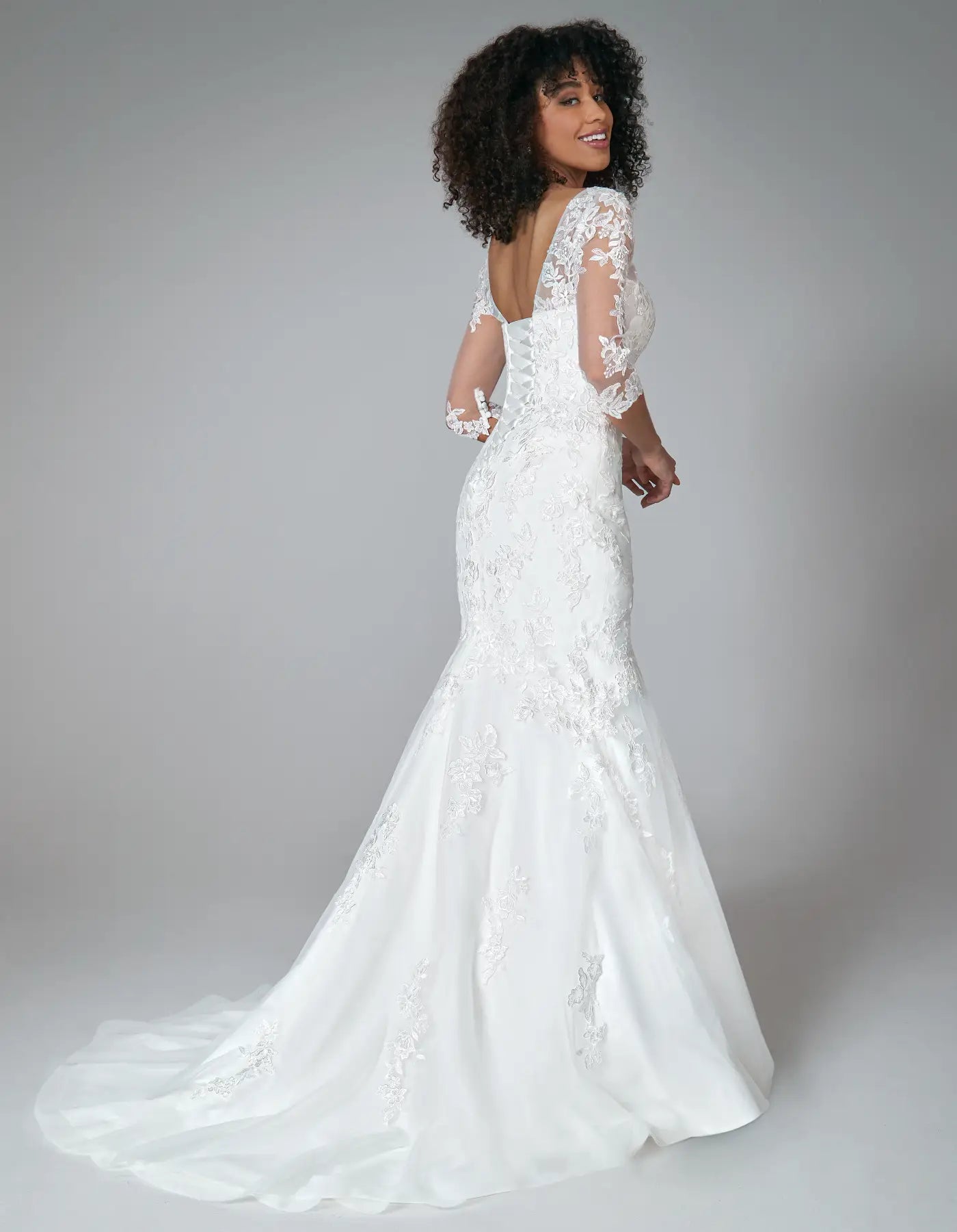 DingJiDress a floral lace mermaid gown with sleeves Wedding Dresses