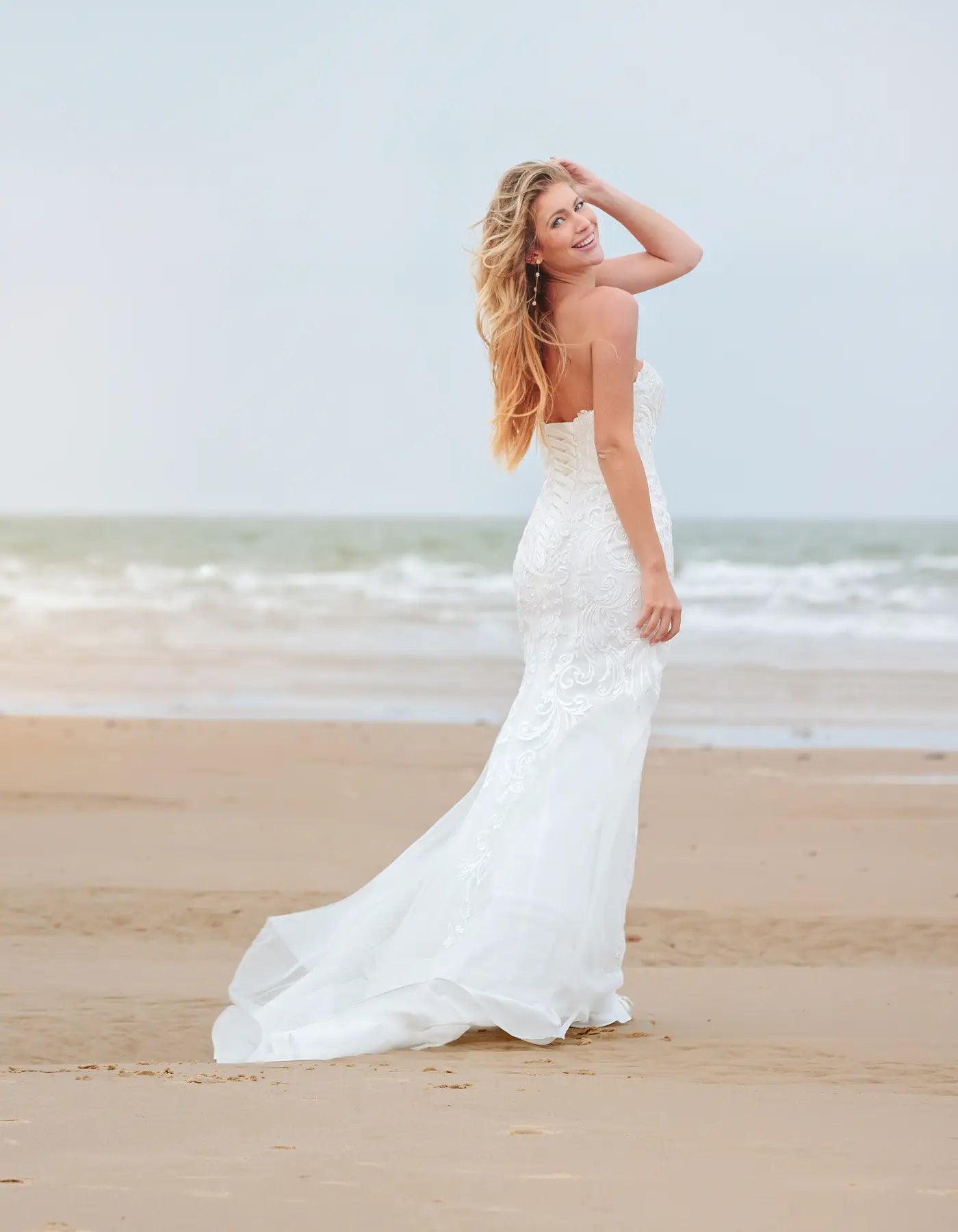 DingJiDress a statement lace sheath gown Wedding Dresses