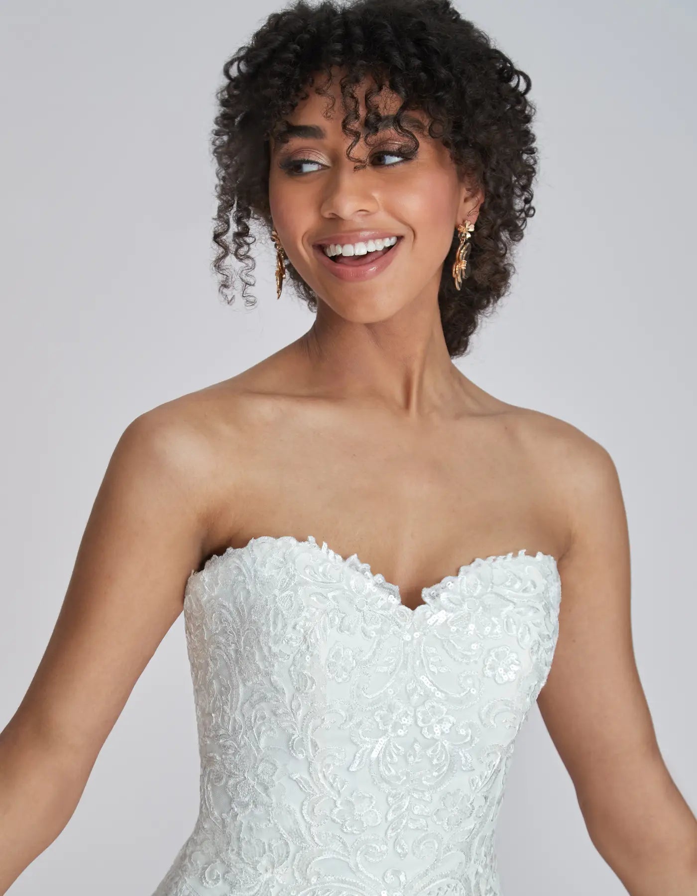 DingJiDress a shimmering strapless gown with taping detail Wedding Dresses