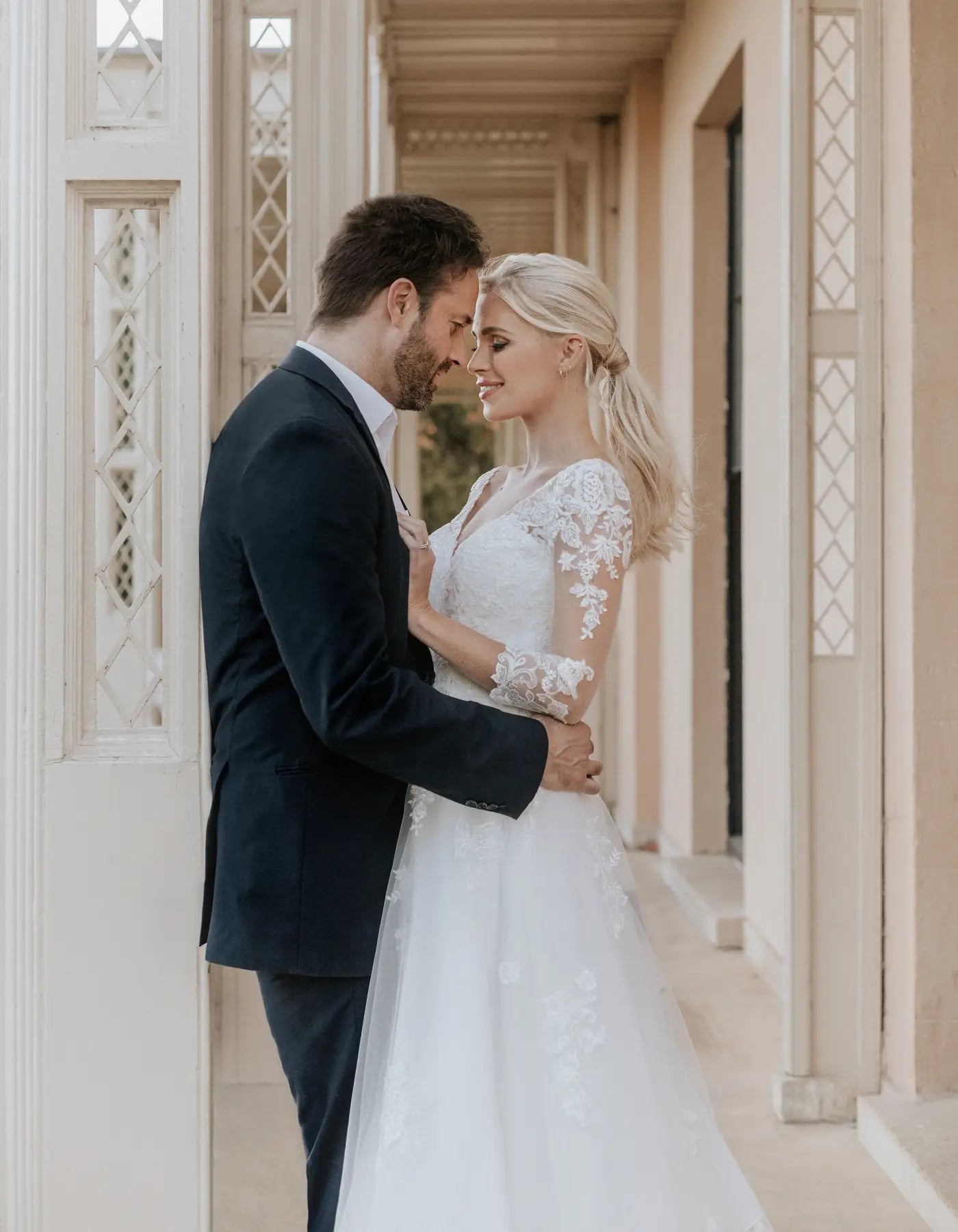 DingJiDress a modern tea length dress with sleeves Wedding Dresses