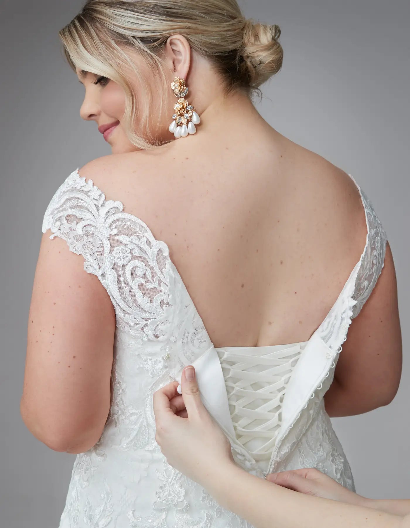 DingJiDress a traditional lace gown with illusion straps Wedding Dresses