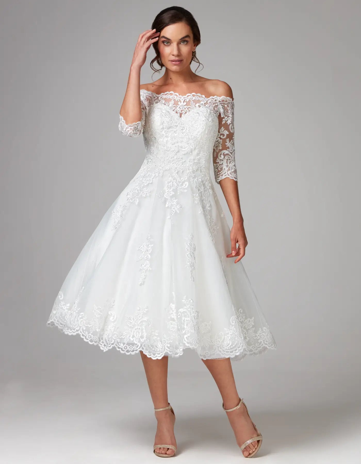 DingJiDress a vintage style tea-length dress with sleeves Wedding Dresses