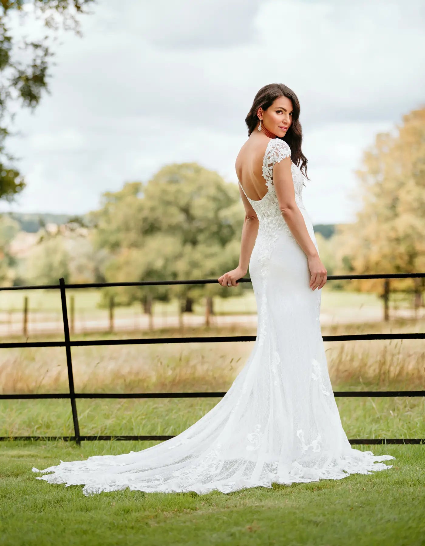 DingJiDress an ornate sheath gown with statement train Wedding Dresses