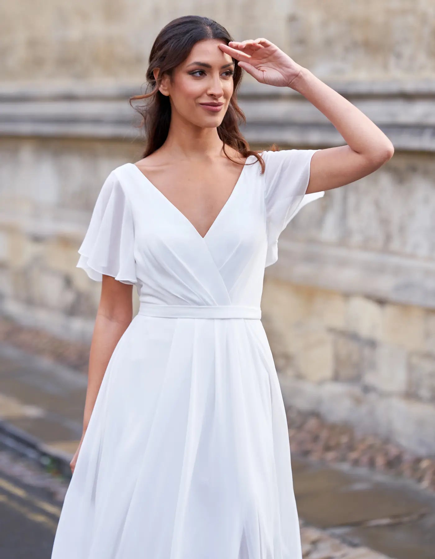 DingJiDress an ethereal boho gown with angel sleeves