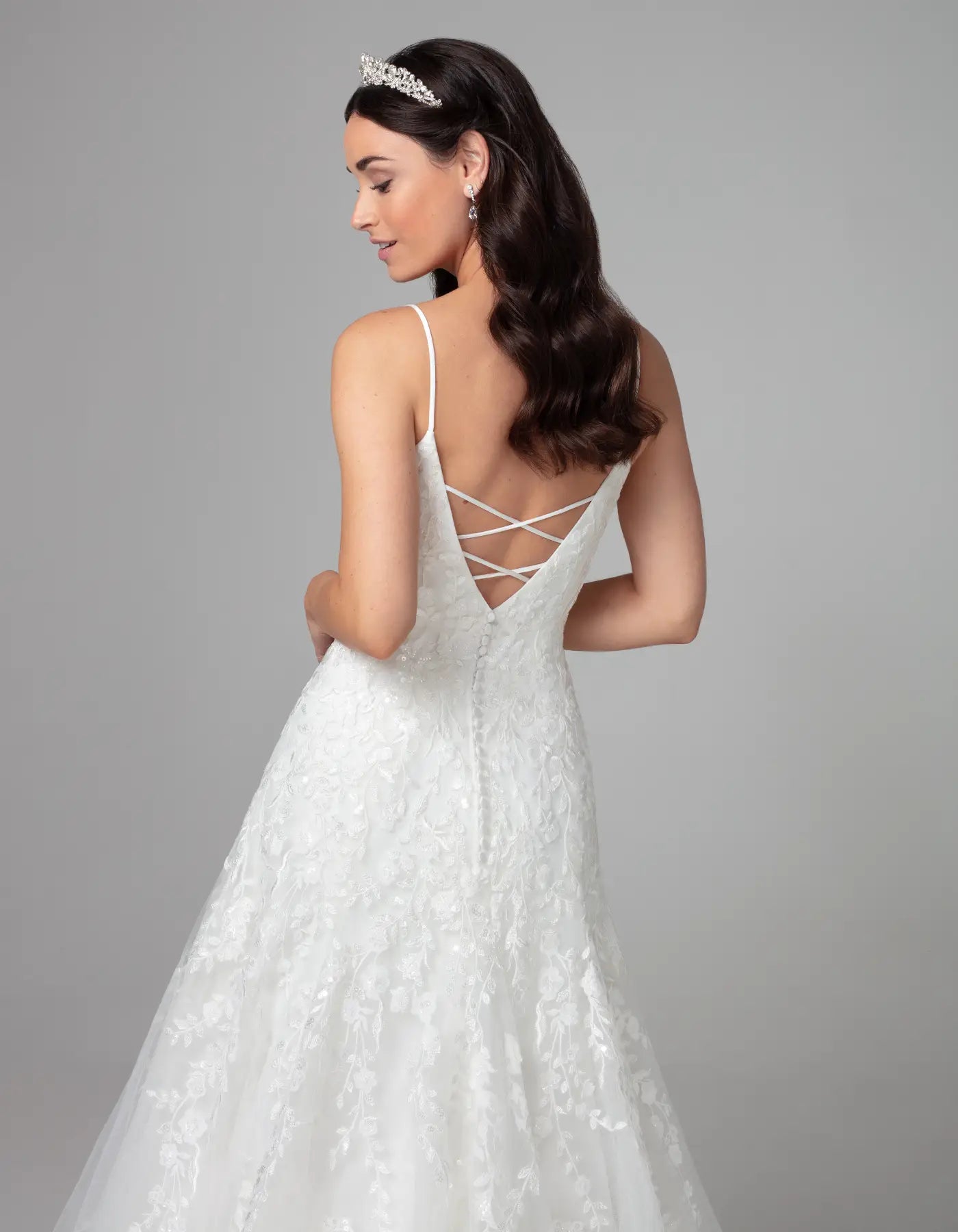 DingJiDress an embroidered gown with statement back Wedding Dresses