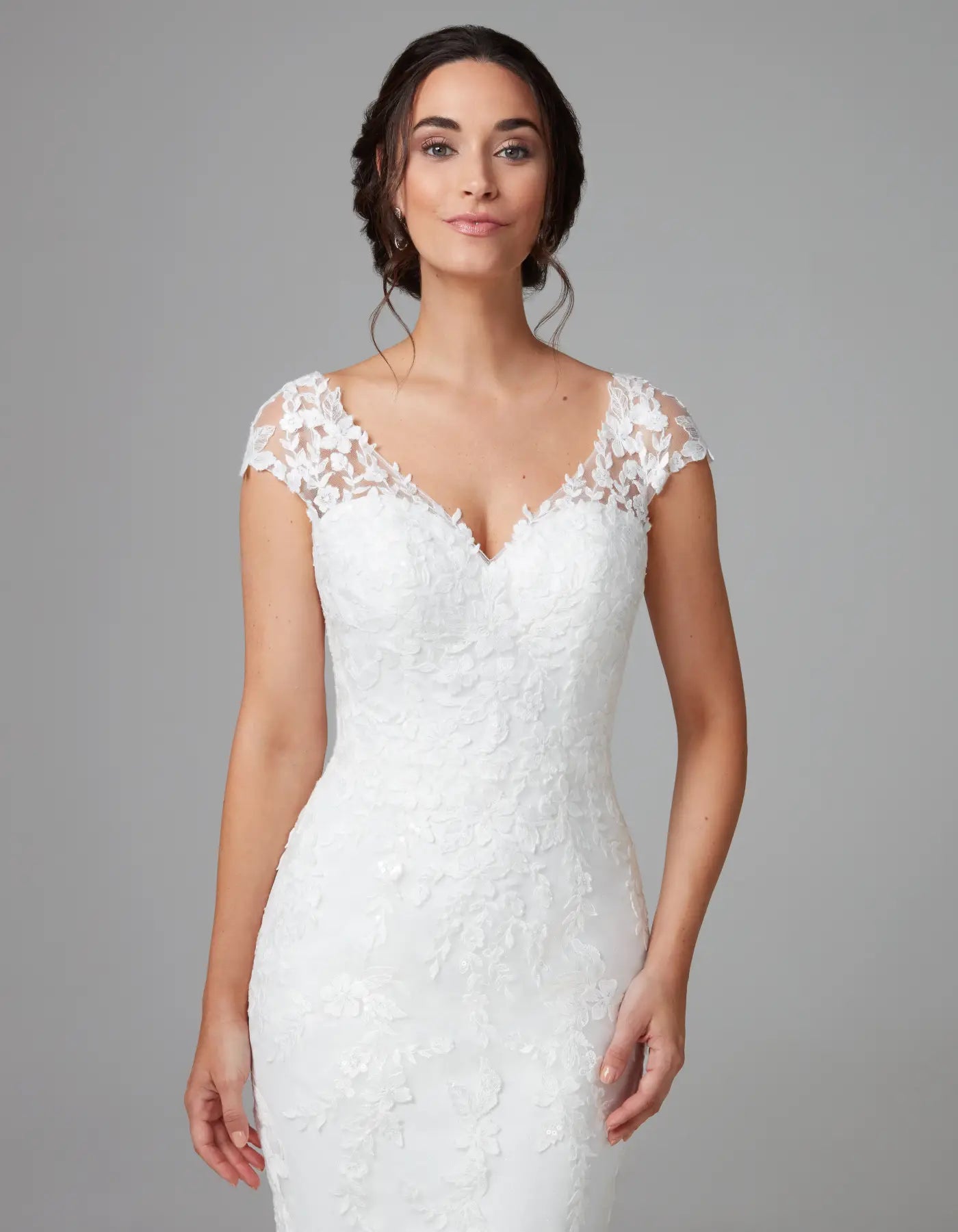 DingJiDress a modern floral lace sheath with cap sleeves