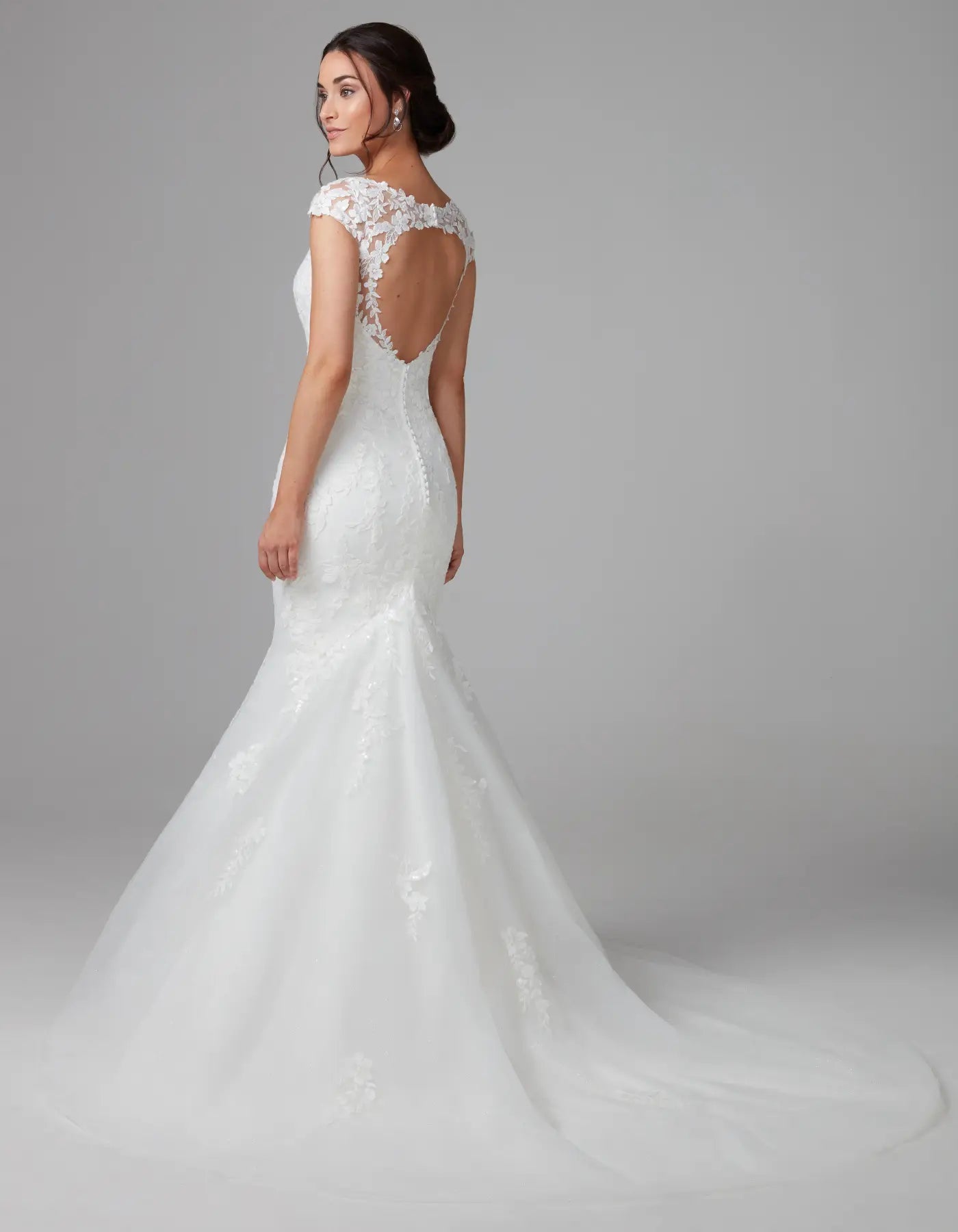 DingJiDress a modern floral lace sheath with cap sleeves