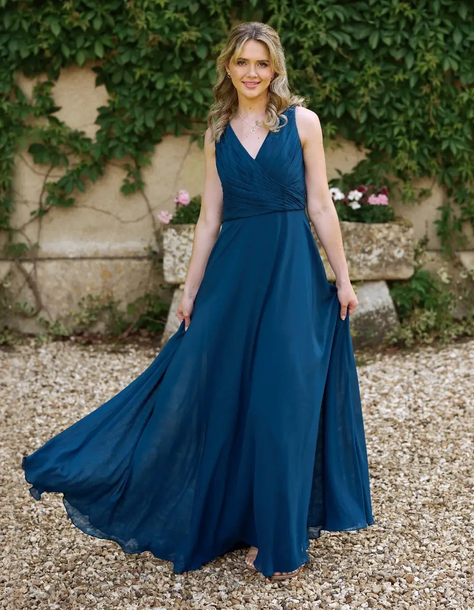 a gorgeous pleated bodice with an unexpected romantic cowl back