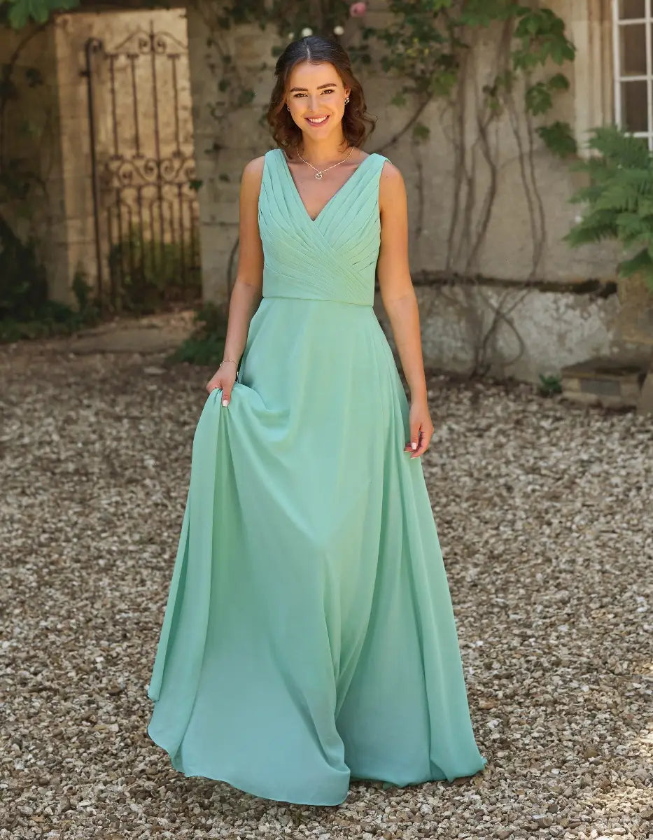 a gorgeous pleated bodice with an unexpected romantic cowl back