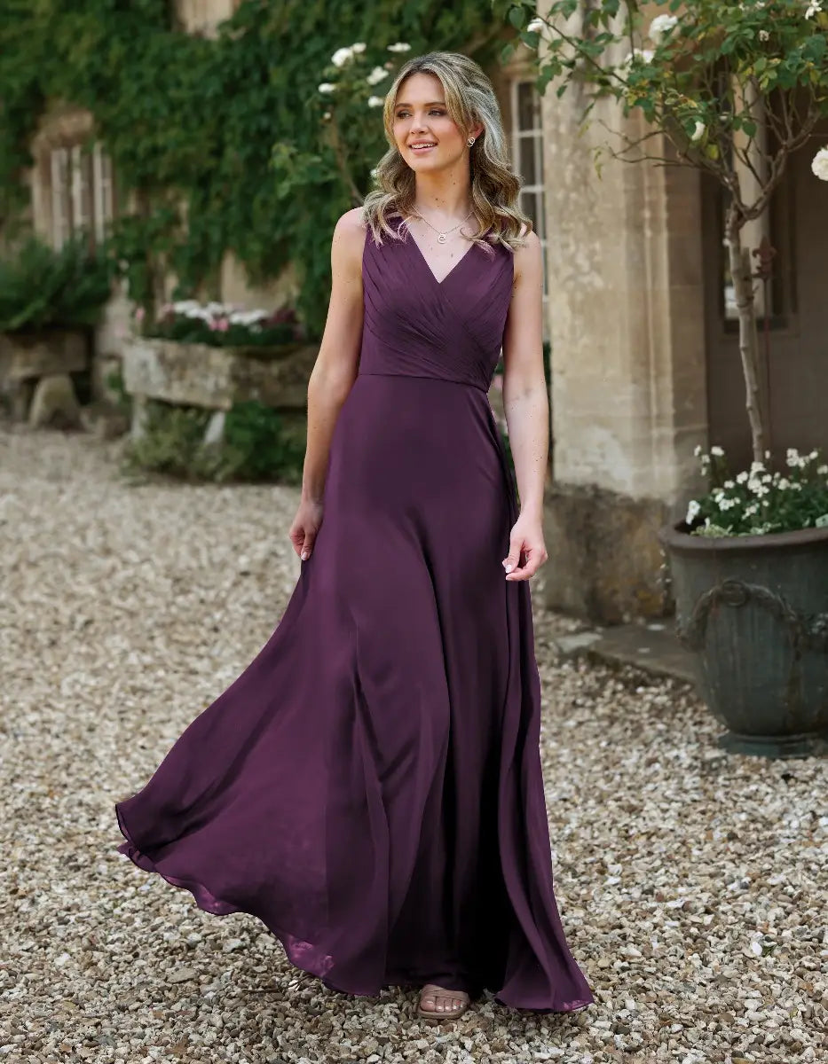 a gorgeous pleated bodice with an unexpected romantic cowl back