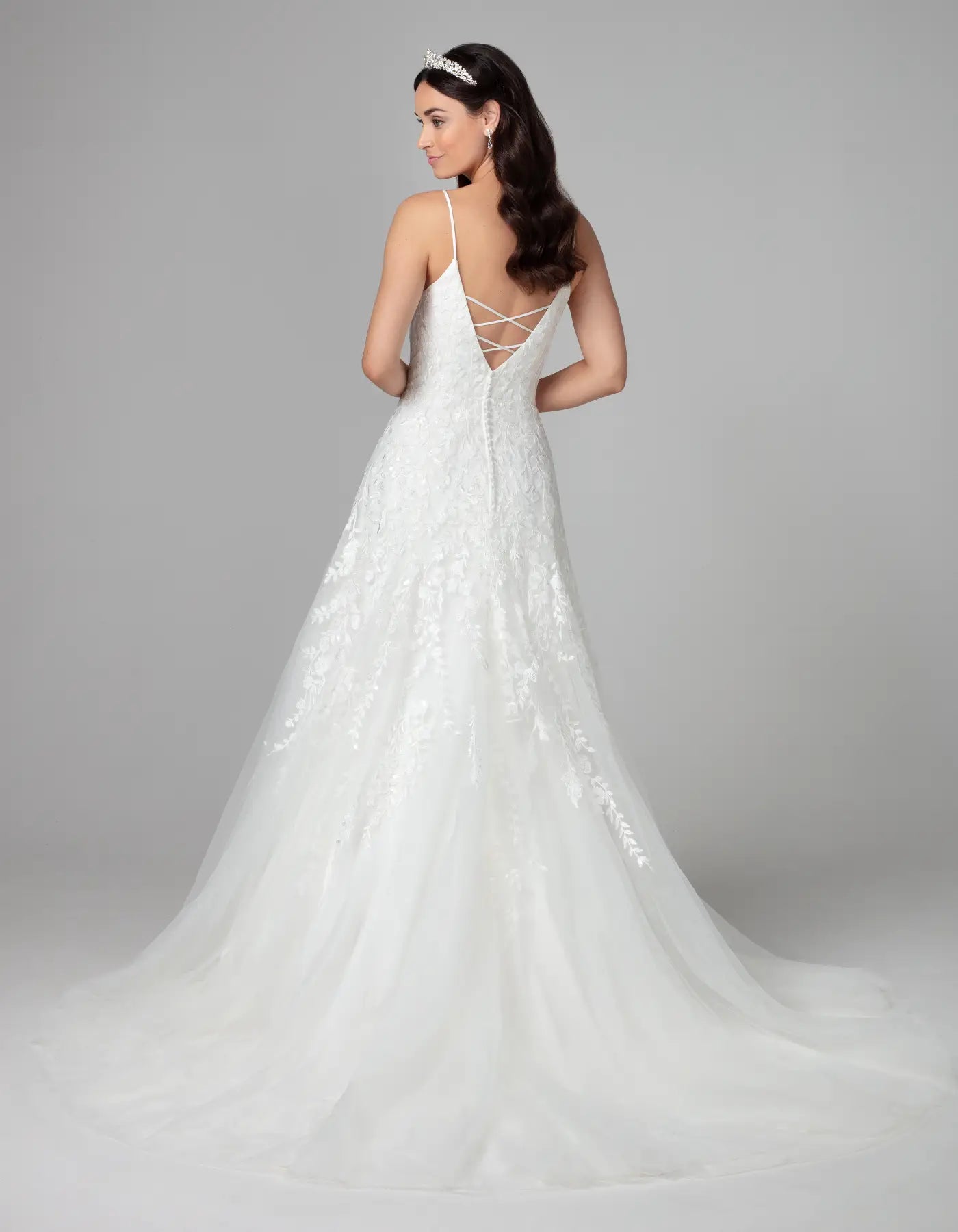 DingJiDress an embroidered gown with statement back Wedding Dresses