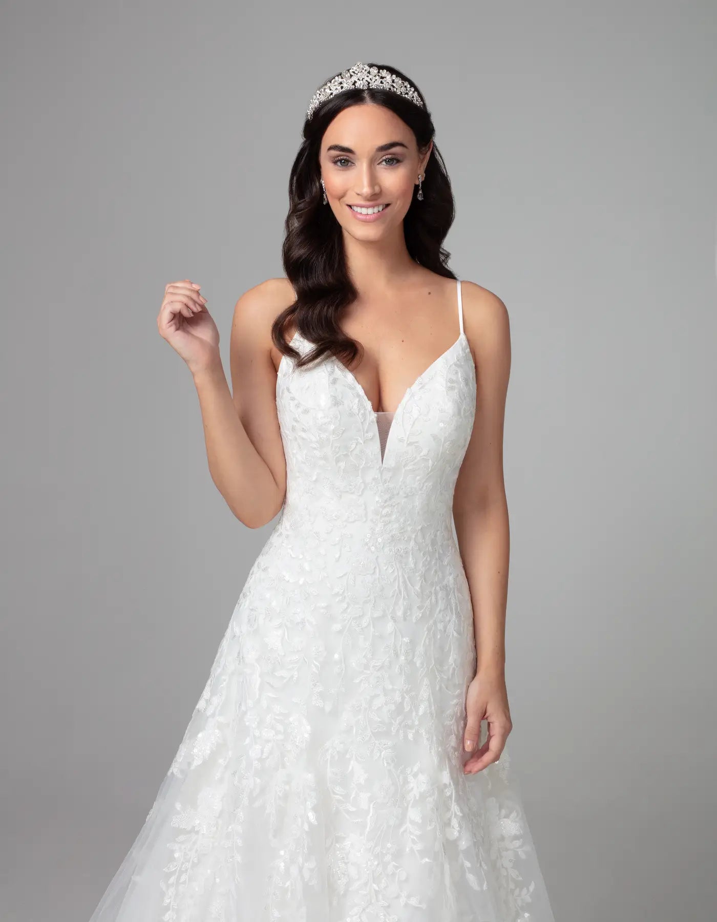 DingJiDress an embroidered gown with statement back Wedding Dresses