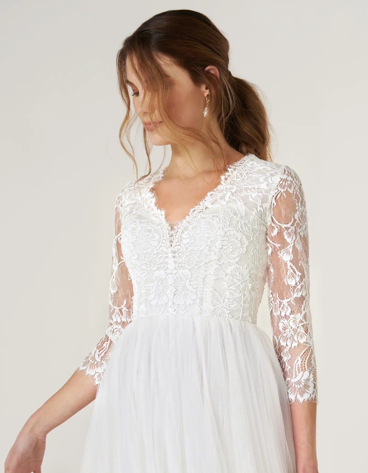 DingJiDress a chantilly lace gown with sleeves Wedding Dresses