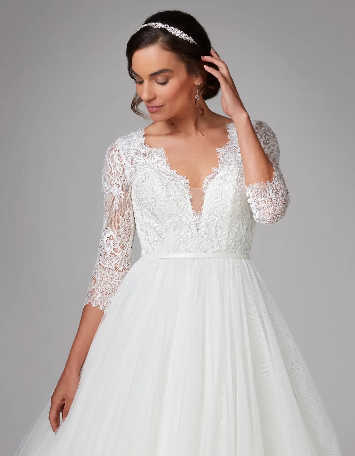 DingJiDress an eye-catching ball gown with romantic lace sleeves