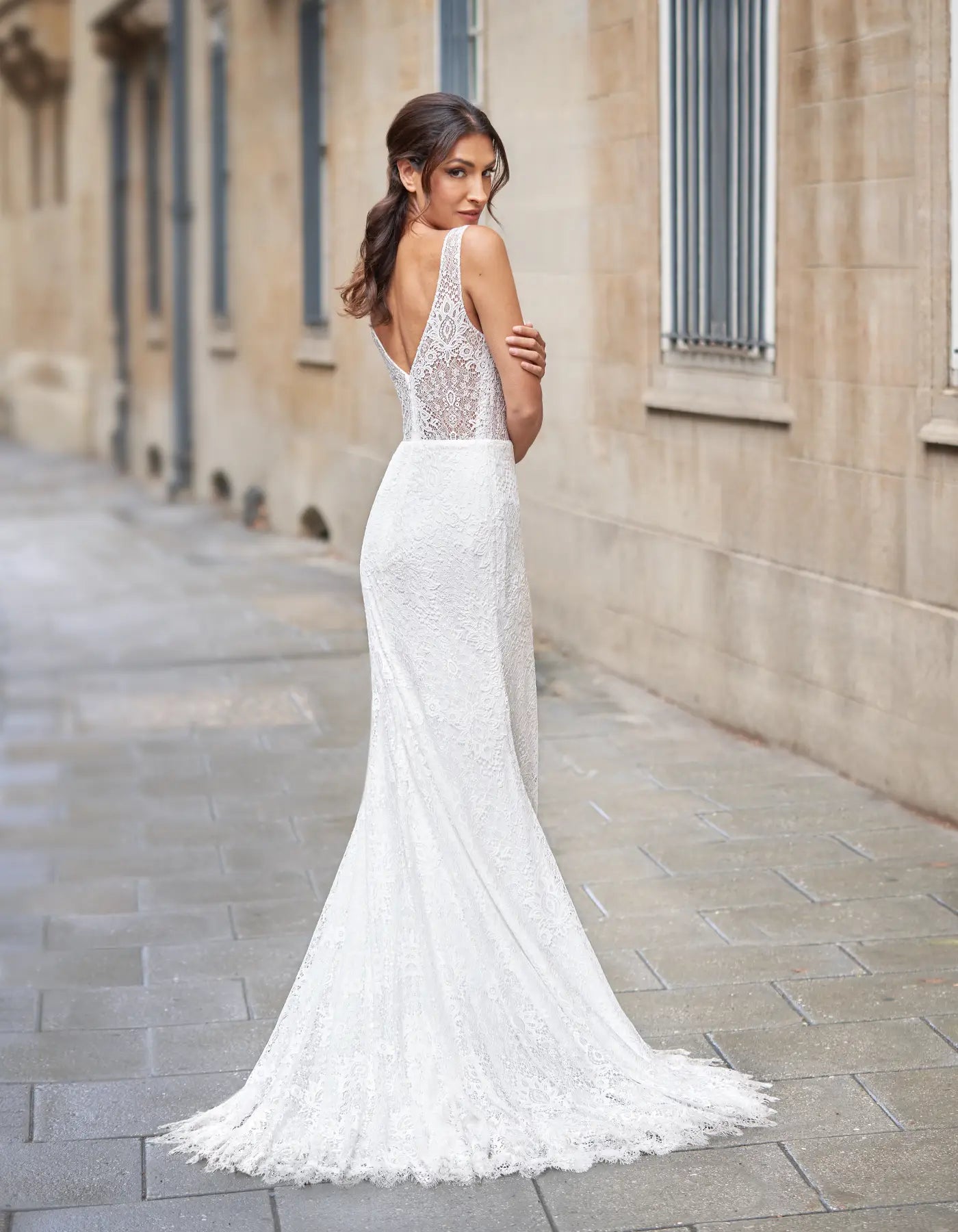 DingJiDress an all-over lace sheath gown