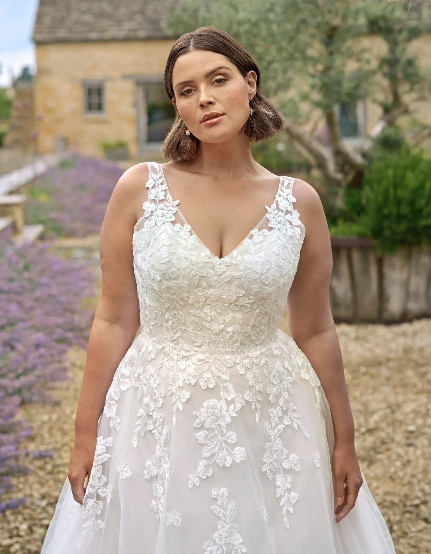a floral lace a-line wedding dress