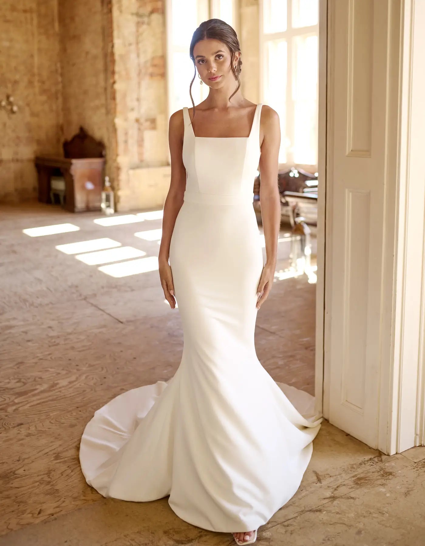 a low back crepe sheath gown