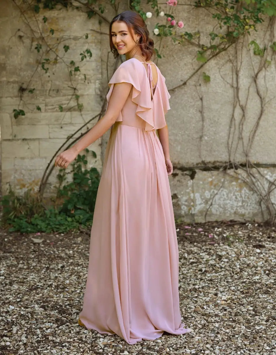 a modern draped bodice with lightweight angel sleeves