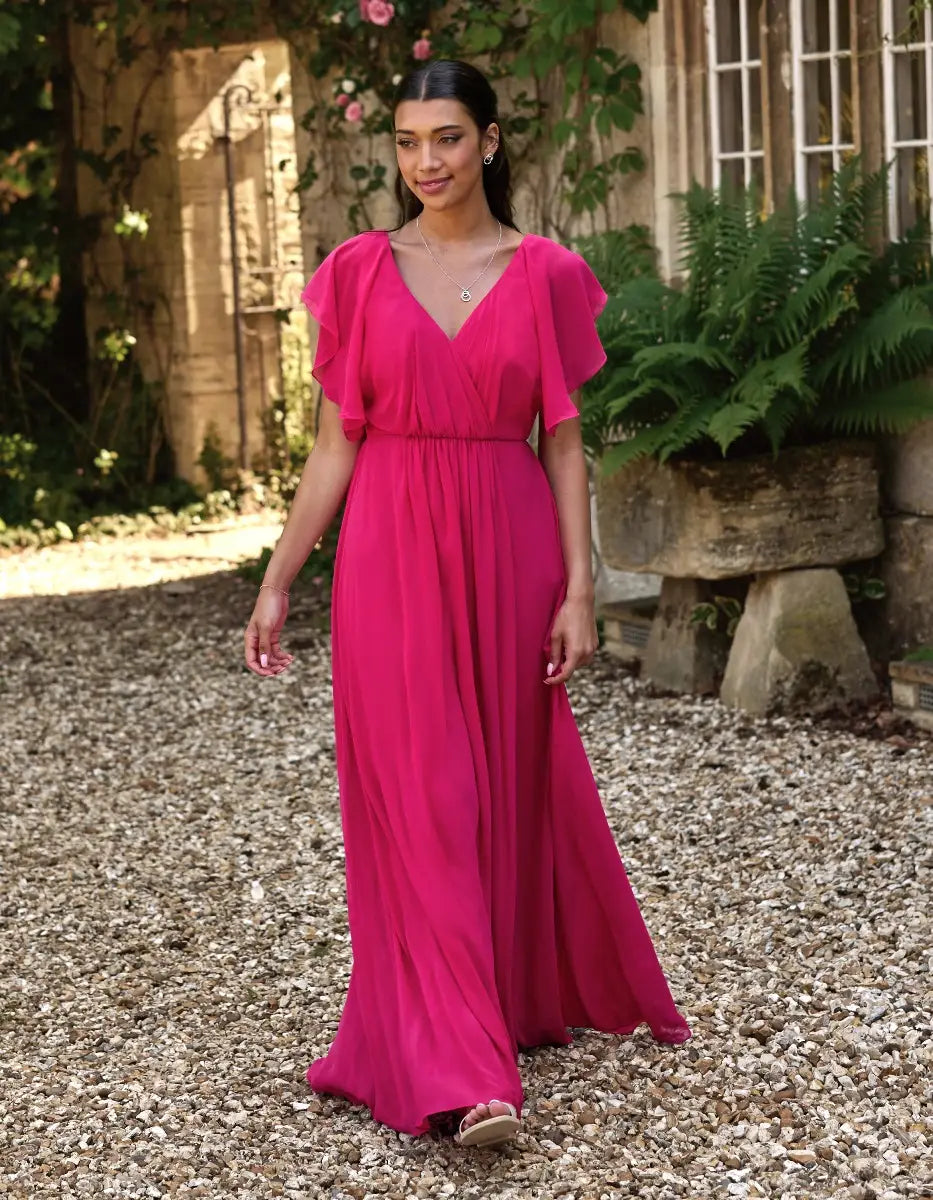 a modern draped bodice with lightweight angel sleeves