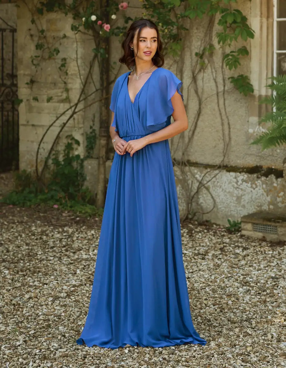 a modern draped bodice with lightweight angel sleeves