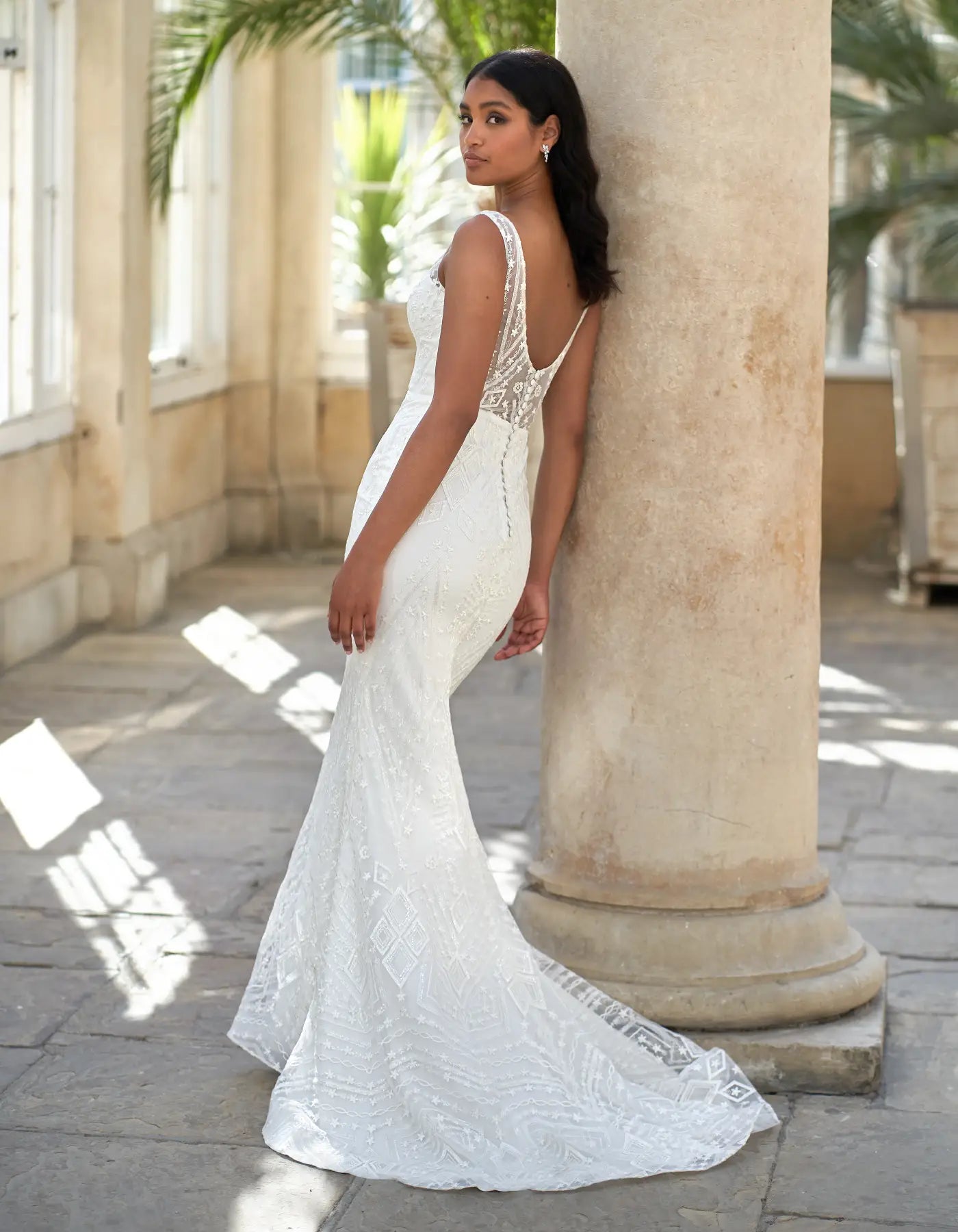 DingJiDress an art deco inspired sheath with plunging neckline