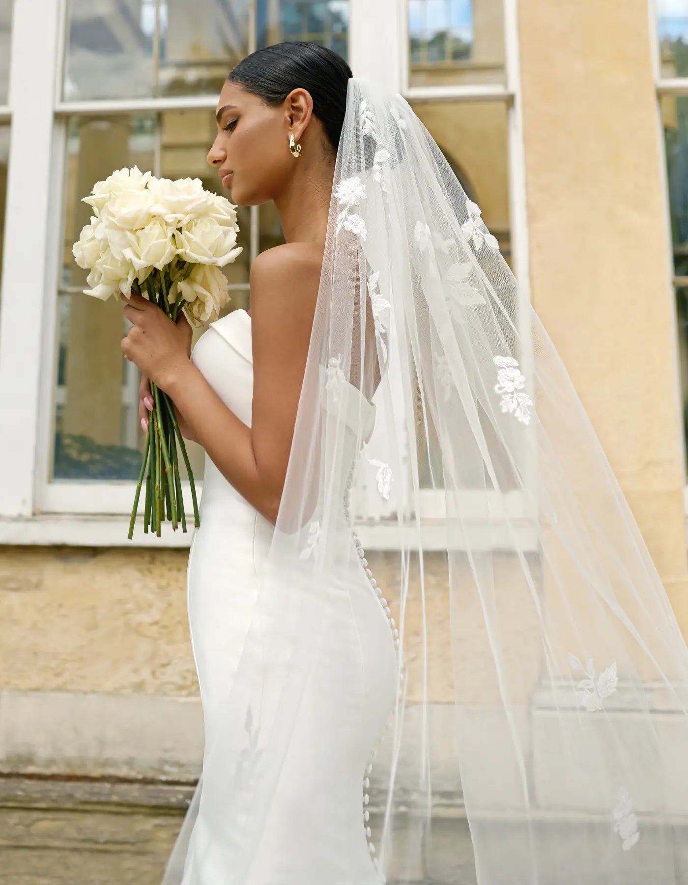 a simple mermaid gown with buttons