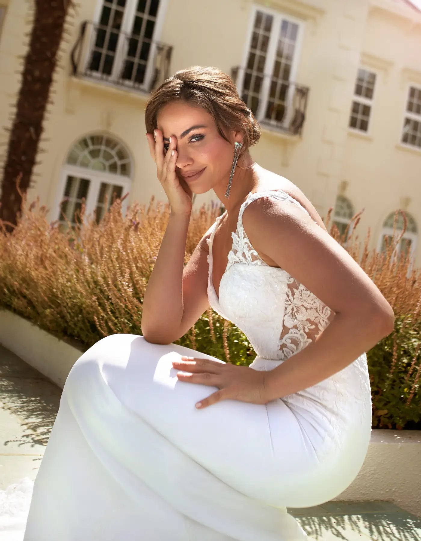 DingJiDress a sheath of lace and crepe with cut-out details