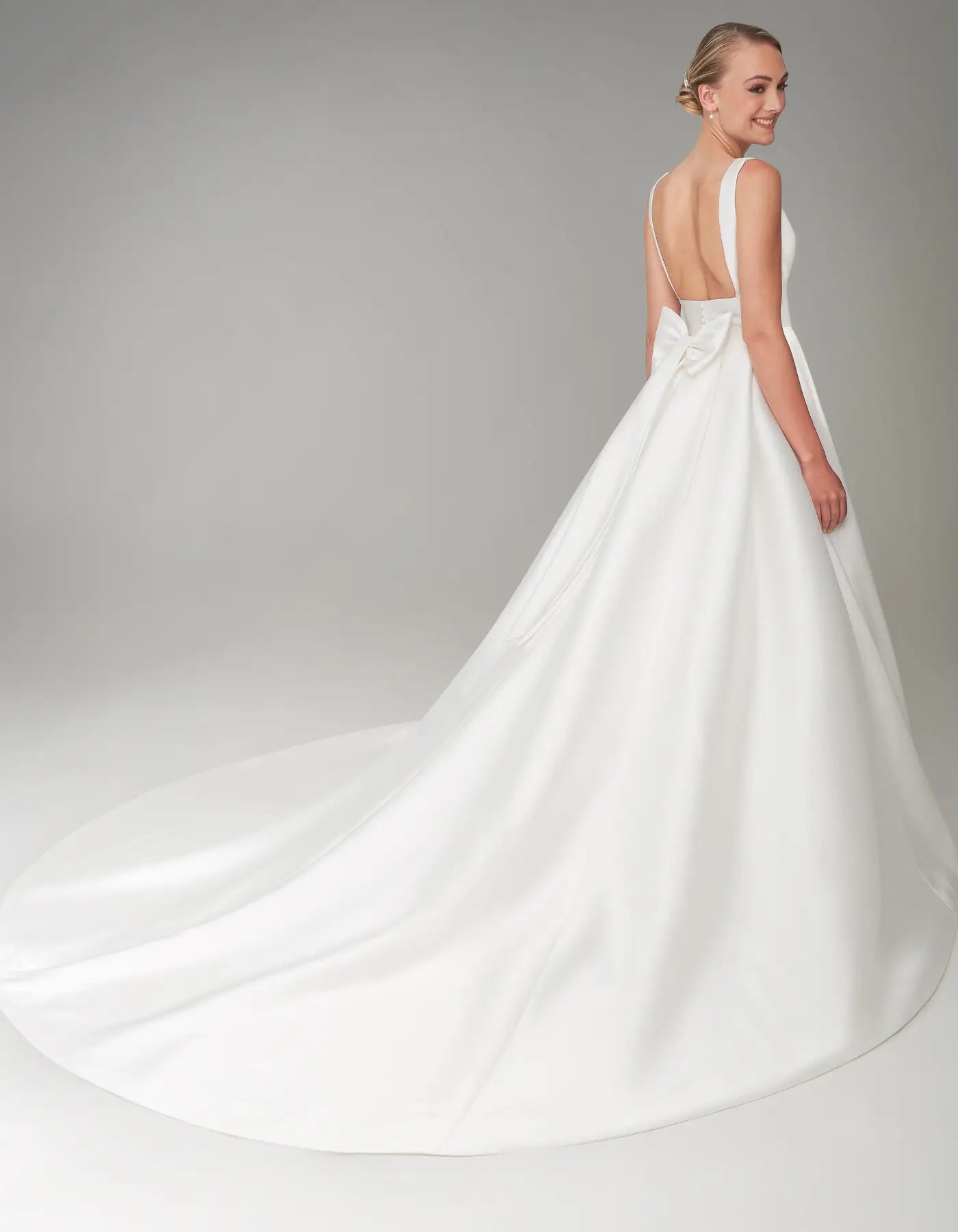 DingJiDress a statement mikado gown with pockets