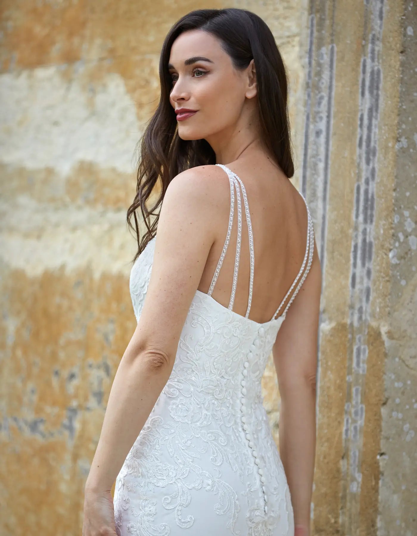 DingJiDress an ornate lace sheath gown with beaded straps