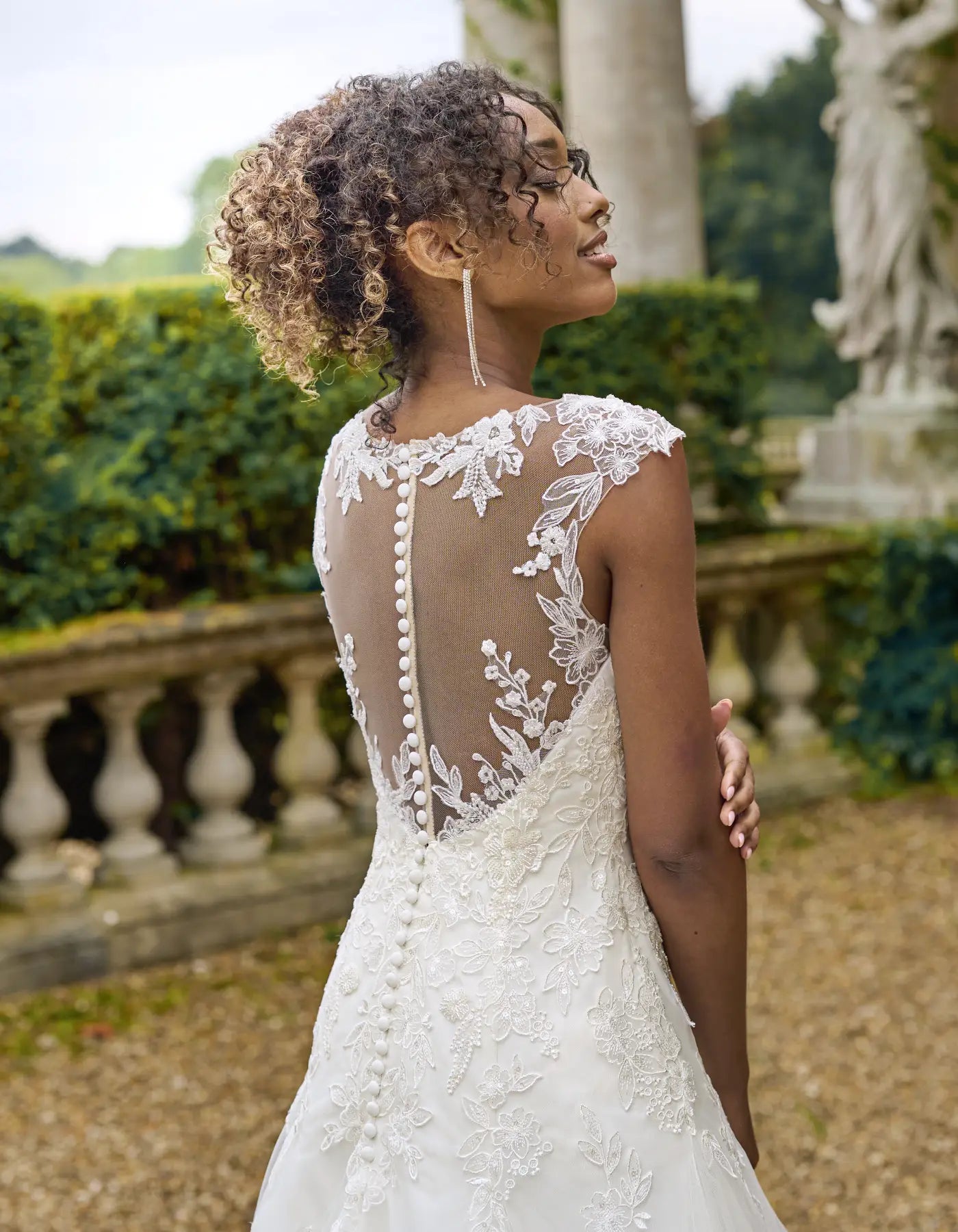 a beaded floral fit & flare wedding dress