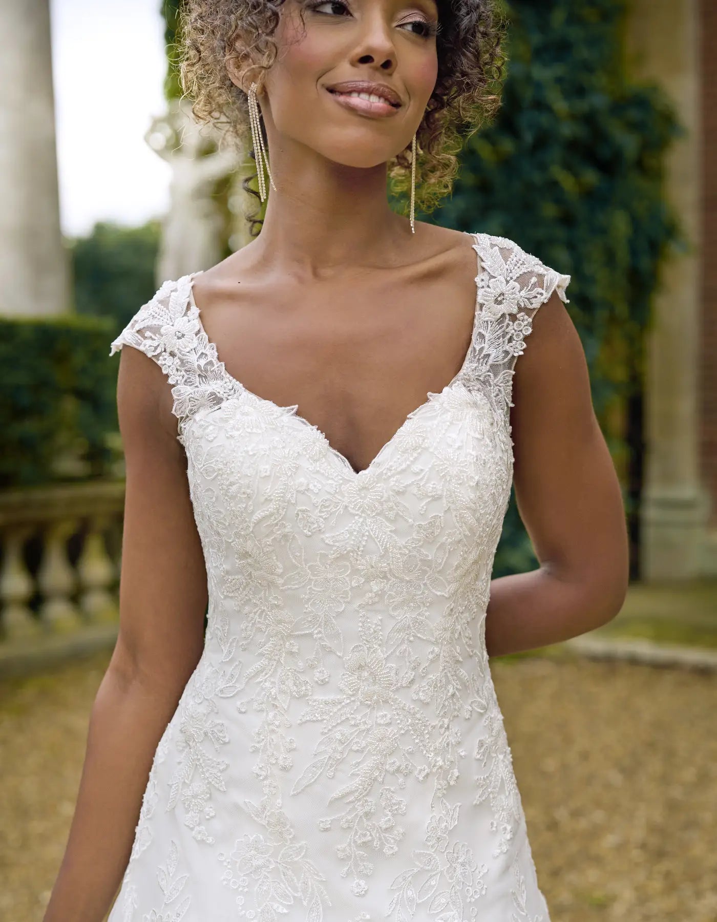 a beaded floral fit & flare wedding dress